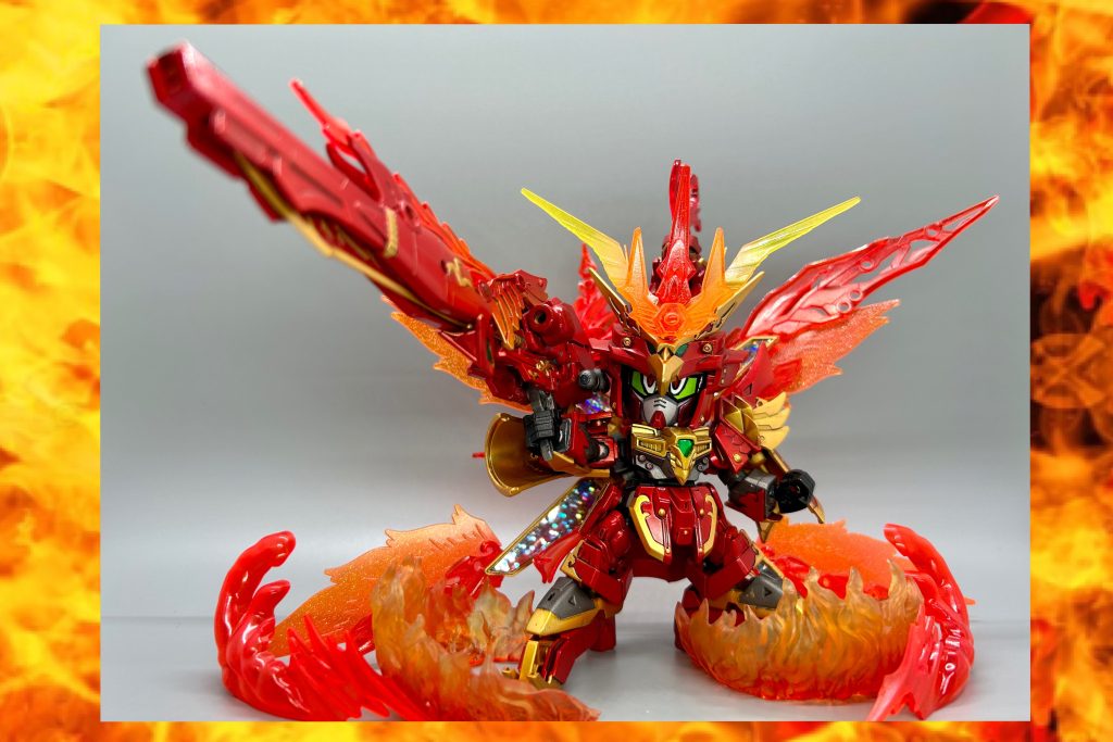 必殺技②凰爆天照波(おうばくてんしょうは)雀瞬の武器を合体させた巨大な大砲から発射する、眼前を一瞬で炎の海と化す程の強力な熱線。モチーフは言わずもがなサテライトキャノン。 ※最初は想定していなかったサテライトキャノン型合体武器ですが…せっかくなので！と組み合わせていくうちに、なんとかキャノンっぽい形に仕上がりました。ちなみに、この一枚が個人的に一番お気に入りなのです！バレバレですが、MGのパケ絵を参考にポージングしています。あのパケ絵、最高にカッコよくて好きなんですよ…いつか組みたいMGのX。  さて皆さん、ここまで来たら最後はいつものアレしかありませんね？ギミック盛り盛り激アツ大サービスの締めくくりといえば…？ そう！変形だぁぁぁぁぁ！！！(終盤でテンションがおかしくなっております、ご了承ください)