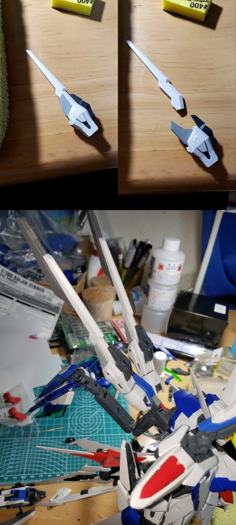 続いてバックパック。いつものダブルオークアンタのシールドに加え、キャリバーンのスラスターを参考に、似たようなものを作ってみました。フリーダムVer2.0の腕パーツと、プラ板を加工してスラスター兼ガンビットラックみたいなのを作ってみました。真ん中で手首に使うボールジョイントを使用してるので結構ぐりぐり動きます。