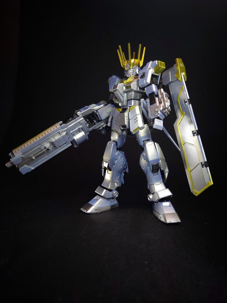 本機は「ZEUS」による管制補助と複合武装システムのシェキナーの運用実験を主としている。試作型シェキナーは高出力ビーム砲のテストとしての意味合いが強い武装で、機体自体の負荷や、他のビーム兵器の使用ができなくなるなどの弊害が確認されている。そのため武装自体に放熱機構が追加され、機体背部には直接ジェネレーターを冷却する展開式の大型放熱版が増設されている。また、副兵装は実弾とヒート系のみとなっている。