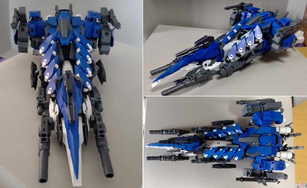 機体前部にGNキャノン、ビームガトリング、機体後部に多連装ミサイルポット、ガトリングガン、さらに機体中央側部に8基のGNリフレクタービットを装備。