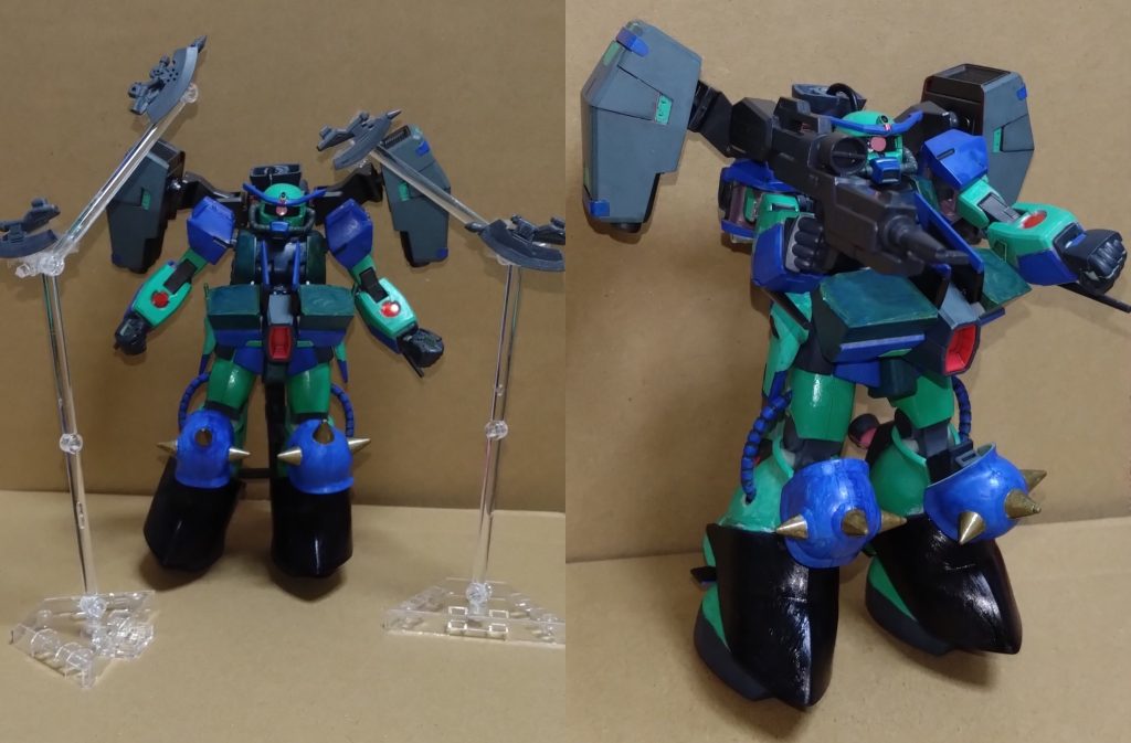 と、ここで警報が鳴り響く。ブリッジにいるキュリアから連絡が入り、とある世界でコピーズが出現とのこと。 X(クロス)は誰に行かせるか考えると、ニノが手を挙げる。 「私に行かせてくれませんか？」「敵は正体を知られたことで本格的に動き始めている。誰かを護衛にしたいが、ここは私がーーー」「カナが行きた〜い♪」 という訳でニノとカナが行くこととなった。自分が行こうと言いかけていたX(クロス)にアースが話し掛ける。 「残念だったな？一緒じゃなくて」「あとは2人に任せよう」「……なぁ、もしかしてニノマエのことが好きなのか？一緒に行きたかったようだし」「なぜそんな話に？」 アースにいろいろと責められる彼は動揺を見せず、落ち着いた様子だった。一方、内面は………と、ここは皆様のご想像にお任せします。 その後、ニノとカナは出撃したーーー   「ニノ・ニノマエ！ザク…改め『GNZ(ガン・ズィ)』行きま〜す！！」  ニノが駆るザクことGNZは圧倒的な性能で敵のコピーズ軍団を倒していく。途中、新ファンネルである『ホークファンネル』も使用して。 「ホークファンネル、お願いします！」 射出したホークファンネルは回転しながら敵を次々と一刀両断。ファンネルだけでなく、ライフル等の攻撃で残りの敵を攻撃しまくる。 しかし、まだ終わりではない…。敵の増援が現れ、数で圧倒されつつあったのだ。 援護で一緒に出撃していたカナのキルトリアWは援護射撃を続けるが、敵はニノのGNZにばかり集中する。初めて目にするMSを恐れての行動なのか、それとも別の理由なのかは分からない。 だが、このままではマズい状況だった。 「防御が高いとはいえ、ここから先はどうしたら……」 その時、通信が入る。メモリー…かと思われたが、声の主は命の恩人であるあの男からだった。 『ニノとカナ、聞こえるか？』 「X(クロス)さん？」「はーい！聞こえまーす！！」 『GNZとキルトリアW、合体でこの状況を打開して欲しい』 X(クロス)が言うには、そもそもキルトリアWはGNZの支援機として開発されたモノ。開発時期はズレたモノの、支援機という立場は変わっていない。様々な武器に変形するキルトリアWと今回初めて出撃するGNZが今、真の姿を見せる。