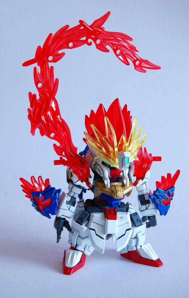 　スーパーモード固定で、こちらはマスターよりもアレンジ強め。三国創傑伝にシャイニングモチーフのキットがないので孫権アストレイでそれっぽく。怒りのスーパーモードやゴッドのイメージも重ねて。顔と肩と手甲が孫権アストレイ、腕がEXSDライフリ、胸と足とサイドアーマーが司馬懿デスティニー、膝（腿）がEGνの足の甲に30mmの腕関節のグレーパーツを載せたもの、炎とバックパックが周瑜アカツキ、腰は30MM、フロントアーマーはHGCEインパルスのパーツです。