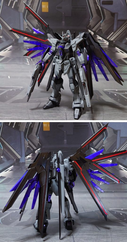バニティーストライクフリーダム、前後ろ。工作は、ゲート痕処理、エッジ尖らせ、パーティングライン・段ズレ・ヒケの対処、面出し、首裏とプラウドディフェンダーの肉抜き穴埋め、市販パーツ貼り付け・埋め込みによるディティールアップを実施。手首は他社パーツに差し替え。些細なアレンジとして、プラウドディフェンダーの刀ラック、大きい羽根(黒い羽根)を左右逆に取り付けてみました。カラーリングについては、“関節を紫で塗る”という自分史上初の試み。金色関節ほど派手ではなく、程よく怪しさを感じられる気がします。