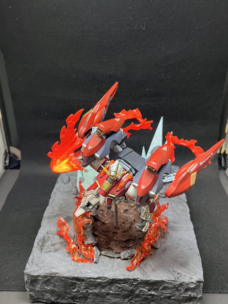 上から視点。こだわった点は、取り巻く炎、えぐれた地面、後ろの衝撃波、飛び散る石です。