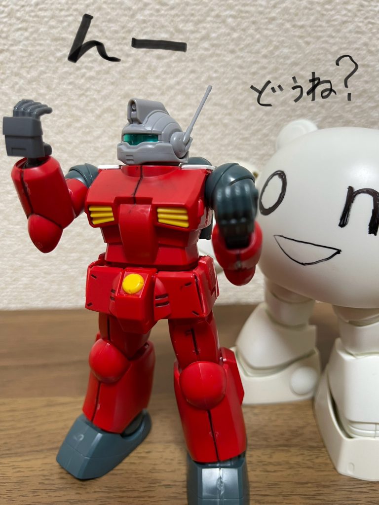 H「着てみた感じ、そんな悪くないでしょ？」T「まあ、ねぇ。てかさ、さっきから気づいてたんだけど、このボディーさ、キャノン付いてないよね？」H「おや、そこに気づきましたか！」T「いや気づくでしょ。キャノンないけど、武器ないの？」H「いやいや、あるじゃないですか。後ろみてくださいよ。」T「へ？」