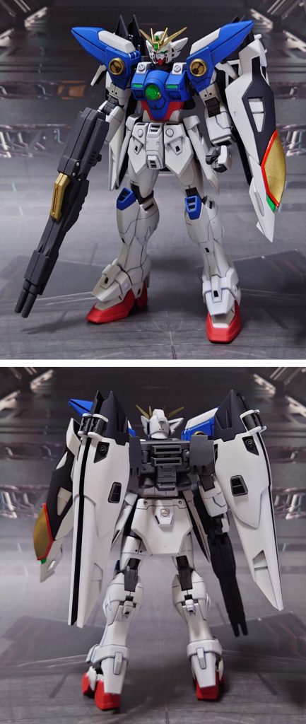 ベース機、ウイングガンダムゼロ(オリジナルカラー)の前後ろ。工作は、ゲート痕処理、肉抜き穴埋め、エッジ尖らせ、パーティングライン・段ズレ・ヒケの対処、一部パーツの合わせ目消し、市販パーツ貼り付け・埋め込み、孔空けによるディティールアップを実施。下記はウイングゼロのパーツを対象にした工作。肉抜き穴埋めは、首関節ポリキャップ、足首関節、足裏、ツインバスターライフルの黄色部(キャリーハンドル?)、シールド裏に実施。合わせ目消しは、肩関節ブロック、脛前面、バックパックの翼アーム部、翼スラスター本体、ツインバスターライフル、シールド先端部に実施。胸部マシンキャノンカバー、肩アーマーサーベルラック部の凸部(指の爪等を引っ掛けるための突起)を削り落とし。肩アーマー内部の可動式スラスターは上下逆に取り付け、下から覗いたときの見映えを向上。胴体内部にプラ板を接着し、肩のポリキャップが奥に入りすぎないよう現物合わせで調整。首関節ポリキャップ、腹部の白に塗装したパーツの底面、股関節の太腿接続部分を1mmずつプラ板で延長してスタイル調整。併せて、足首関節の接続部にストッパーを噛ませ、接続後の外に出る部分の長さを1mm延長。ツインバスターライフルのトリガーガードを削り、“トリガーに指が掛からない問題”を緩和。併せて、銃口先端の上下に分かれている表現のディティールを埋め、シンプルな筒型の銃口に変更。シールド横の、ウイングバルカン部は(孔開けに失敗したので)丸っと削り落とし、分割したツインバスターライフル接続出来ないので変形機構は忘れる、という割り切りモデリング。不要となったツインバスターライフルのシールド接続穴も埋めています。