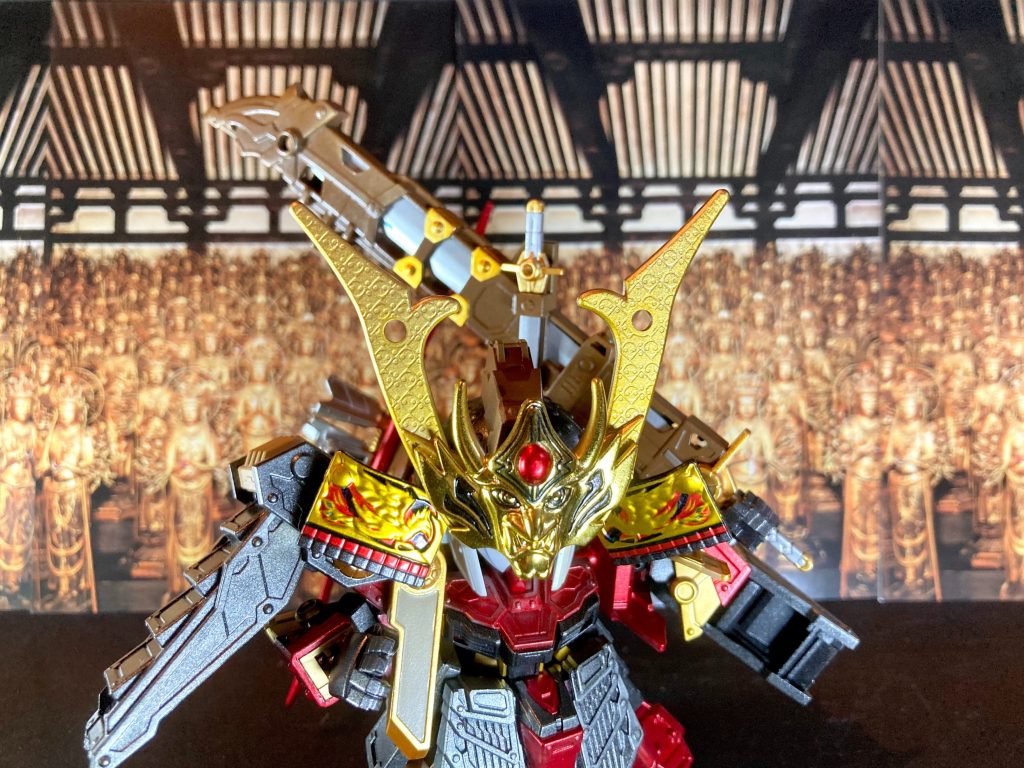 【蓮華王院・三十三間観音御堂】平清盛頑駄無が御仏の加護に依り展開する幻想戦闘領域。主君・後白河法皇のため柱間桁行33間に渡る長大な御堂と一千一体の千手観音を献上した霊験が、 33代目武者頑駄無を襲名する事で強力に増大し顕現した。三万三千三百三十三尊菩薩の御利益で仏敵を一刀両断する!