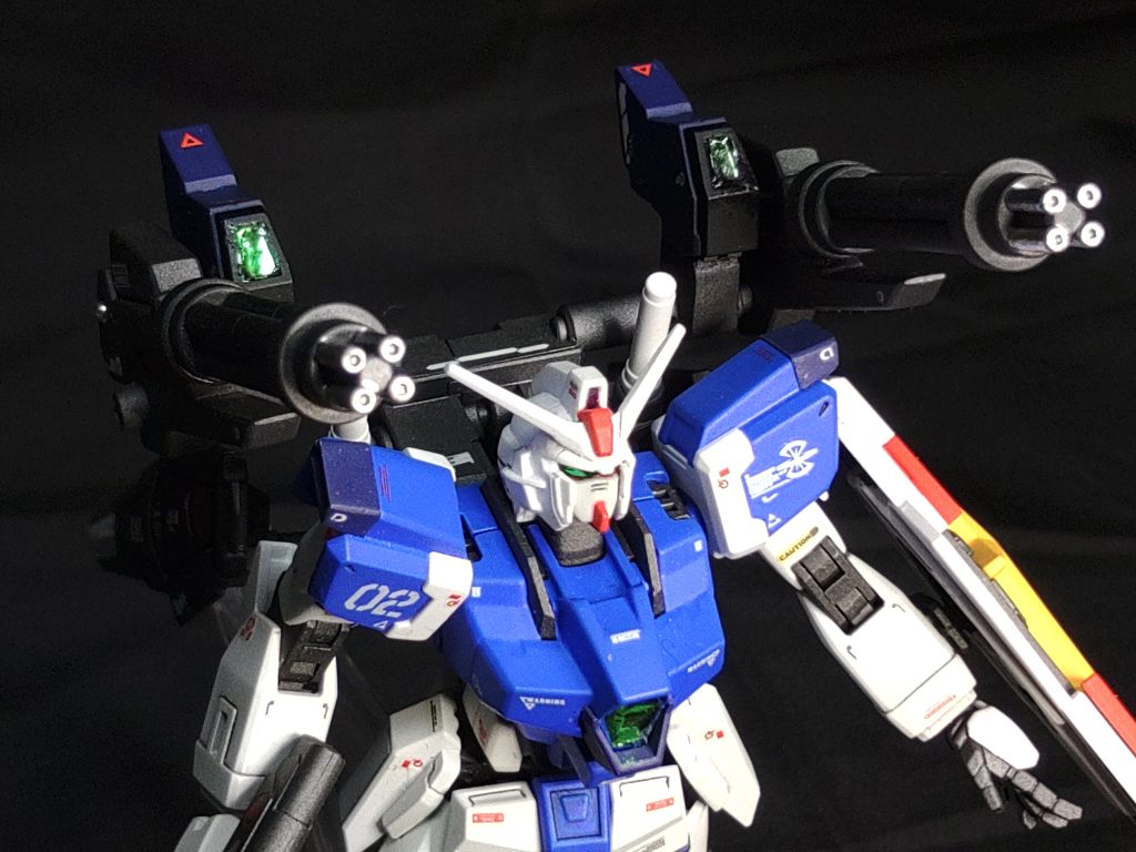 MMI-M826αハイドラ ガトリングビーム砲改スラッシュウィーザードにあるハイドラの改良型でロングバレル化と標準用のセンサーユニットと一体化した物で、後方よりの弾幕支援が可能である。