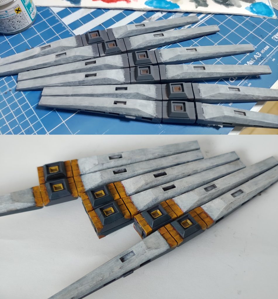 とにかく、このファンネル、作るのも塗るのも面倒くさくてしばらく放置していました。どうせ6本同じパーツでしょって、ザクザクとランナーから切り離したら2本づつ違ってて、面倒臭さが加速してしまいました。あと、そもそも黄、オレンジ系は発色以前に全然塗料の乗りが悪くて大変です。特にフィンファンネルの真ん中の凹んだ中にある黄色部分の塗り分けが面倒くさくてどうしようかと思っていたのですが、エナメルのチタンゴールドで一回塗ると一発で発色するので、その上にハイネオレンジ塗ったらいい感じになりました。境界部分きっちり塗り分けしてないので拡大して見るのは禁止です。