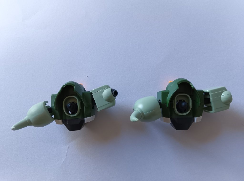 最初、肩アーマーの胴体側を1mm削って「スゲェ動く」と思ったのですが、正面から見たとき隙間が気になったので、ランナータグを貼り付け0.5mmに修整。ただ、このサイズで0.5mmは大きいのか最初より可動範囲が狭くなりましたが、動かすときは腕を少し引き出します。右が無加工で同じだけ引き出しています