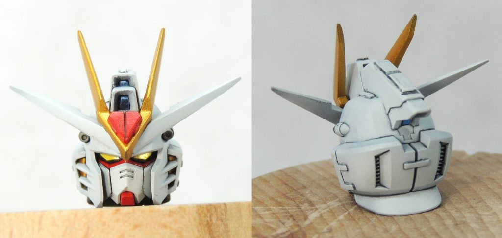 ヤスリによるアンテナの先鋭化と頬あての小型化、デザインナイフによる頭頂部カメラ周辺のフチの削り込み、細切りプラ板の貼付け等により、キットの形状を変更するとともにディティールを追加しました。