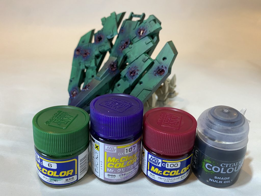前面装甲の弾痕で使用した塗料です。グリーン→ハンダでダメージ加工→弾痕周囲にクリアパープル→ハマーンレッドで筆塗り→ナルンオイルで雑に汚す昨日、コミケにてマブラヴ 新作SRPG『マブラヴ タクティクス(仮)』の発表があり、テンション爆上がりです。何にせよ、好きなコンテンツがこれからも続いていくというのは嬉しいです。 ご覧頂きありがとうございました!
