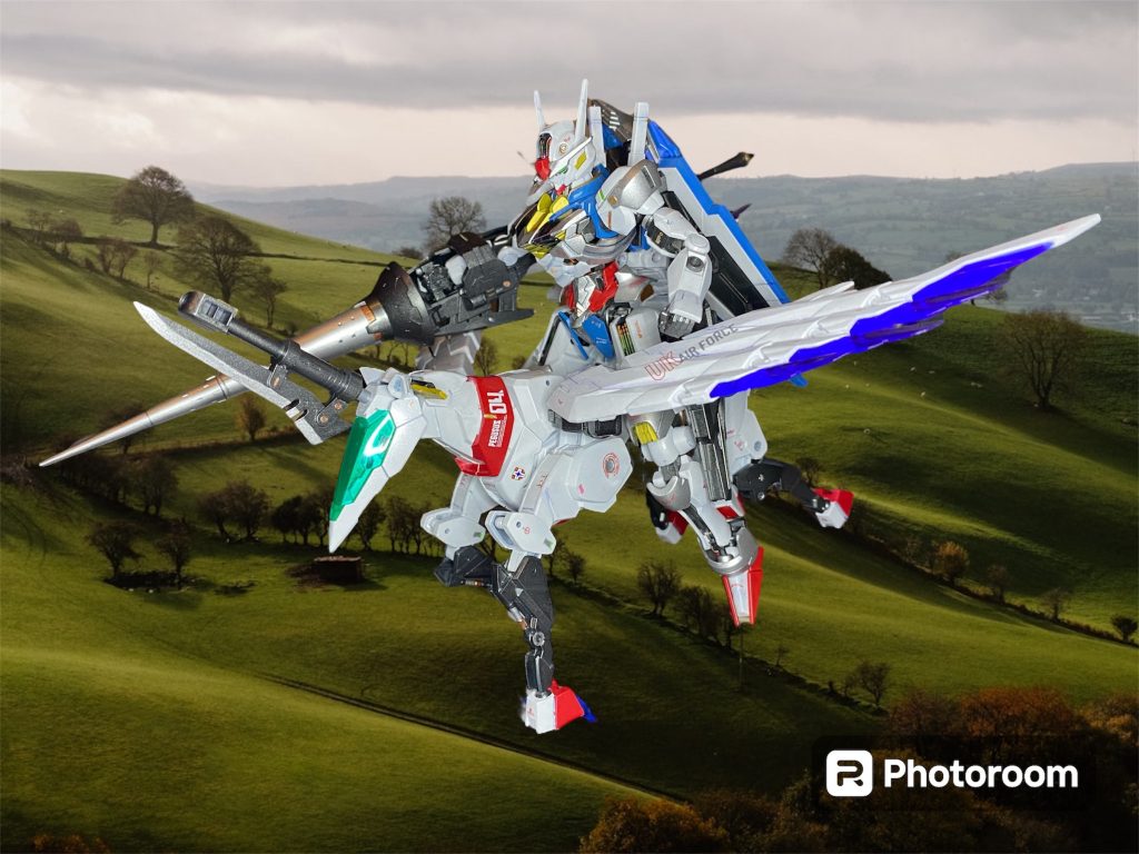 ストーリーはGガンとビルドシリーズの世界観を掛け合わせたような設定で創作しました。製作中にちょうどパリオリンピックが開催され、各国代表がアツい戦いを繰り広げた夏。なんか、セーヌ川にもペガサスナイトみたいなん飛んでたな〜笑中世ウェールズの騎士よろしく、馬上槍試合のような一騎打ちです。