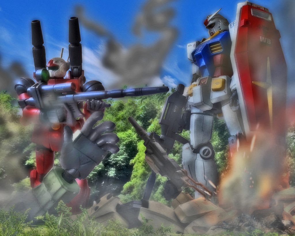 「ティターンズが解体以降、一年戦争については様々な資料が世に出回りました。これもその1枚です」「これは噂に名高いRX-78-2ですか？」「ええ、ジオン軍によるジャブロー攻略戦が0079の11月30日にありました。その時のもので、その攻防戦に、後に第13独立戦隊と呼ばれるホワイトベース隊も参加していたという写真です」「当時はホワイトベース隊は地球連邦市民にとって偉大なる勝利の象徴でしたからね。写真越しでも何かオーラの様なものを感じます」