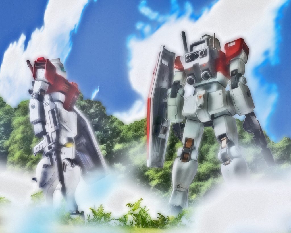 『小さな巨人』「写真の裏にそう書いてありますね？」「これは戦争後期のジャブローの写真です。オデッサ作戦以降、地球連邦軍は主戦場を宇宙に移すのにジャブローから連日宇宙戦艦を打ち上げていたそうです。この白いMSはおそらく基地守備隊のジムですかね」「MS開発に出遅れた地球連邦軍ですが、ビンソン計画では簡易的ながらMS搭載機能を備えた宇宙戦艦を大量建造したという記録がありました」「今、ジャブローは核汚染により一般人の立ち入りは禁止されていて、どんな状態かは分かりませんが当時は打ち上げる施設が沢山あり地球では最大規模だったそうです」「全長約18mのMSも巨大な戦艦の打ち上げの前には小さく見えますね」