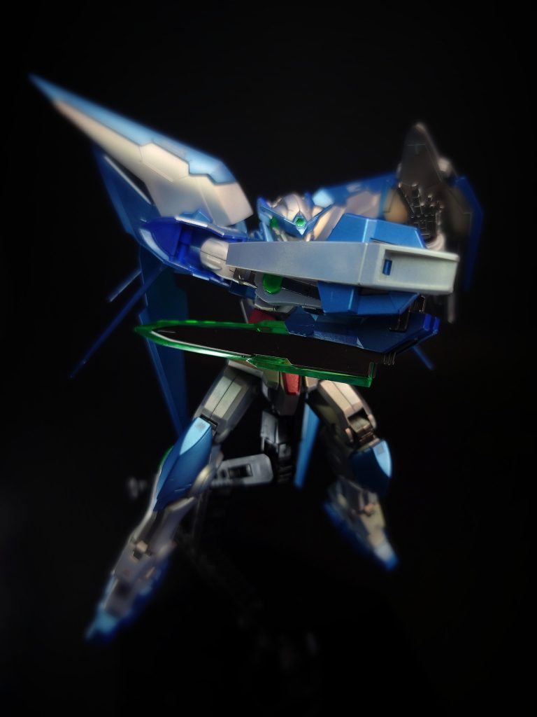 決勝戦の直前に更なる改造が行われ、完成状態となった。背部には「トランザムブースター」と呼ばれるバックパックが装着されており、トランザムの安定化を目的としている。また合体時は運動性や機動性、推力を向上させ、複雑な飛行も行えるようになるといった効果を与える。更に分離する事で支援機としての独立行動も可能で、エクシアとの連携や偵察等といった行動がとれる。分離時にはGNドライヴはこちらに搭載されている為、支援機としてはかなりの高出力を誇るが、一方でエクシア本体は出力が著しく低下してしまう。なおブースターが破壊された場合、GNドライヴは分離されてオートでエクシアの背中に合体するようになっている。実際に決勝で用いたガンダムエクシアダークマターとはカラーリングの影響で印象が大きく異なるが、基本構造等に差は無い。