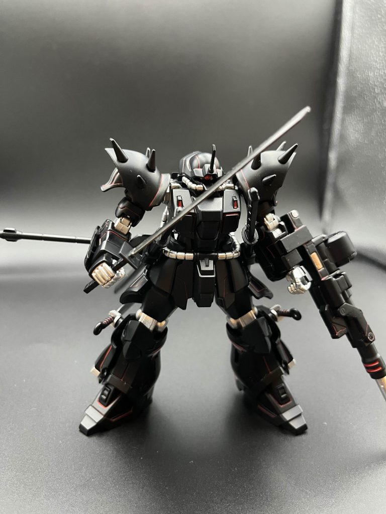 ジオ・リベリオン(以下ジオン)の部隊(死神部隊)の主力機体の一体見た目はかつての宇宙世紀時代のイフリートナハトだが、ジェネレーターなどは最新のものになっておりまた、ホバー移動なども可能なため地上での機動力であれば地球再生連邦(以下連邦)の機体を上回るただし空中戦等はやや苦手である