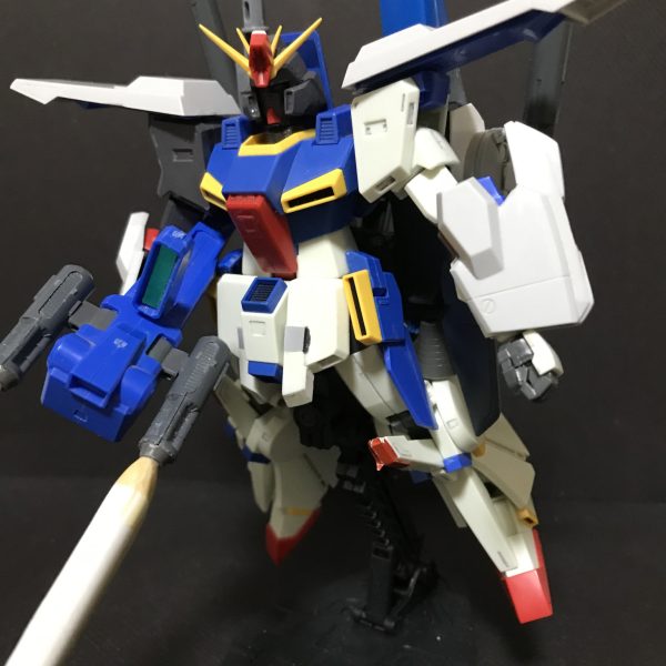 バックパックの改造。当初はS-ガンダムのパーツとジャンクパーツで構成していたが全体的に下に下がってしまっていたので全面改修。WAVEのG-TANK S アクションベースの基部を切った貼ったしました。腰後ろアーマーは自作しました。その他アーマーはチリ合わせを実施しネオジム磁石を埋め込み実施。腰メガキャノン動力パイプを黒配線コードに変更。（4枚目）