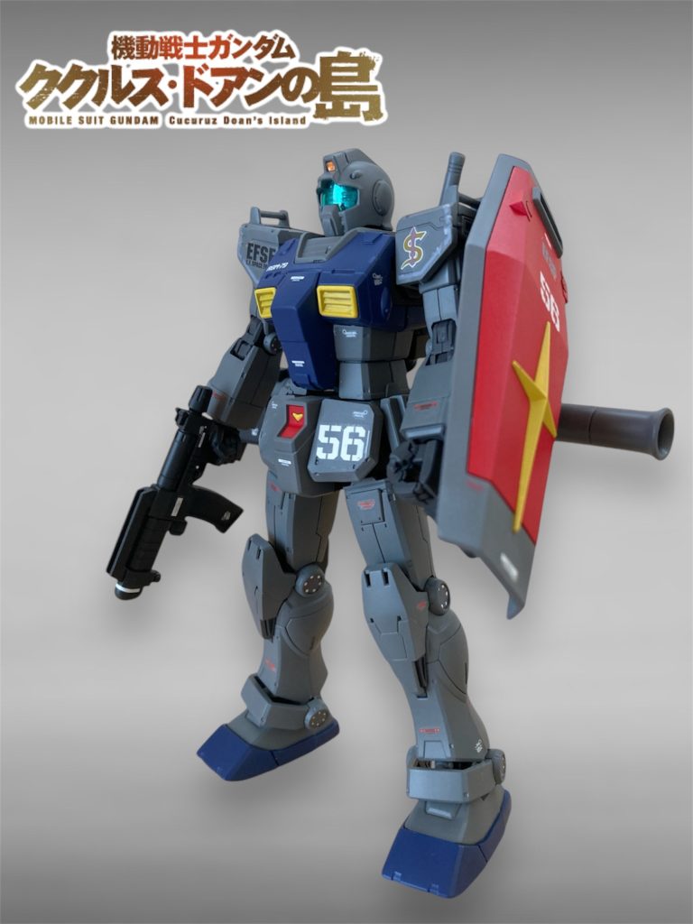 ジムの量産型試作1号機としてホワイトベース隊にテスト配備されたものをスレッガー中尉専用とした機体という設定（Zでいう百式みたいに）です。この為、頭部含めた多くの部分はグレーで試作機っぽくしてみました。紺色（ティターンズブルー2+α）はスレッガー中尉のノーマルスーツの色をモチーフに。試作1号機なのでこの時点では肩と膝パーツがガンダムと共通という設定にした事でノーマルよりもこちらの方が力強い印象になりました。またシールドもガンダムと同じものにしています（こちらはテレビアニメ版設定と同じ）。