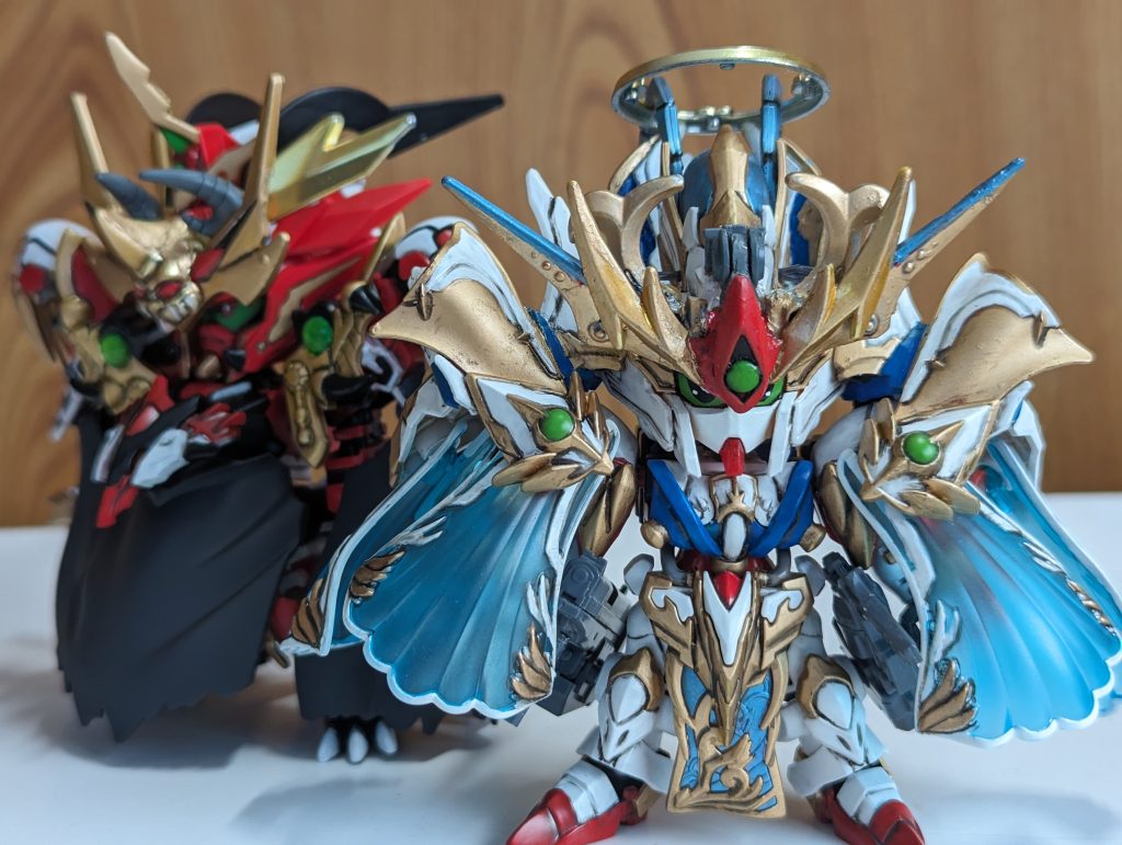 (写真 左 鬼神・羅刹王 右 魔人サンダルフォン)ストーリーの流れいよいよ魔人サンダルフォンの力が暴走し始める。黒幕登場 ゴッドの上司にあたる。「神官イスタルガンダム(仮)」ゴッドにお前は何もしなくていい。その娘がすべて終わらせてくれる。回想 スピードマスターマッハガイからの助言。前に渡した二丁拳銃はあるか?もう時期 力の制御が出来なくなる。今の内に装填しておけ。リボルバーを左に3回転 右に5回転 左に2回転してみろ。特別な弾丸が装填される仕組みになっている。カートリッジの方はリロード1回 空砲3発 リロード1回という手順だ。ここぞという時に使え。 サンダー!俺に向けて撃て!!?ゴッド君ーーー受け取って!しかしーーー銃を弾かれ落としてしまう。暴走が激しくなり身を震わせる。なぁサンダー。お前光を吸収出来るんだよな?なら逆に放出も出来るんじゃないか?日食という能力により太陽から吸収し続けた膨大なエネルギーは放出すればコントロール出来ず、地球上の半数の生命体が蒸発する事になるだろう!俺を信じろ!うわぁぁぁ!カッ愚かな選択をーーー。サンダルフォンが今までために貯めた光エネルギーがゴッドへ放出される。が制御出来ず広範囲に放射。しかし。光は軌道を変えゴッドへと収束される。空間湾曲!今この空間は俺の支配下にある。鬼神君!?サンダーお前は独りじゃない!