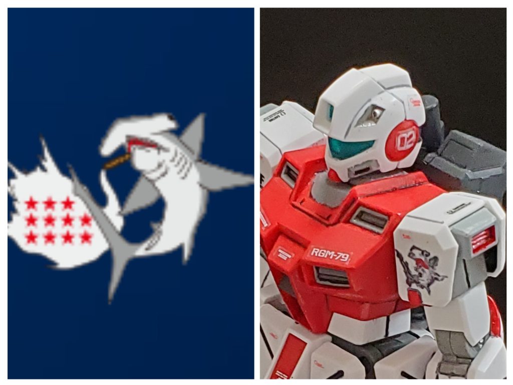 そして今回の目玉その２～✴️テネス・A・ユングのマークは画像左のようにシュモクザメ🦈なのですが…市販ではこのシールを入手する事は不可能😱💦てな訳で初の試みとなる手書きでパーソナルエンブレムを左肩に描いてみました～😅💦極細筆🖌️で一生懸命フリーハンドで描いてます🎵猛者の方々のように上手く出来てないので細目でふんわりと見て頂けるとありがたいです🤣💦 