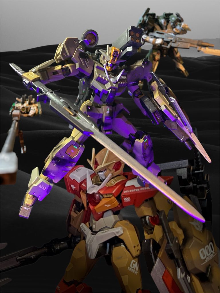 ストーリーは、前回までとうって変わって、ビルドファイターズのレナート兄弟を主人公に書いてみました。無骨なミリタリー系が好きな彼らなら、きっとこのキットも作っているに違いない、と。レナート兄弟って三兄弟、ならチームバトルにもそのまま出れる!00三部作の機体総出演でお送りしました。シン・レナート小隊が00の世界観をモチーフにしたエクストラミッションに参戦したら?という妄想を描いてみました。量産機ばかりを使い、ガンプラバトルも戦争と割り切ってきた彼らも、きっと昔はガンダム好きな少年時代を過ごしていたはず。メイジンとの対戦を経て、忘れていた「ガンダムが好きだ」という純粋な気持ちを少し想い出したそんな瞬間を切り取りました。「目覚めてくれ、ダブルオー、、、」の名台詞のオマージュは自分も絶対言いたい、勝ち確のテーマ!w今回もご覧頂きありがとうございました(zaku-kao2)