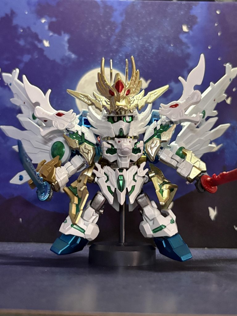 最初に白龍大帝のパーツを追加しただけだと小さく纏まりすぎてる気がして面白みがなかったのでエクスヴァルキランダーの羽根を追加したら程よくボリュームが増えたのでよかったです戦闘時に顕現するイメージ「父祖より受け継ぎしこの双剣を恐れぬなら掛かってこい!!」