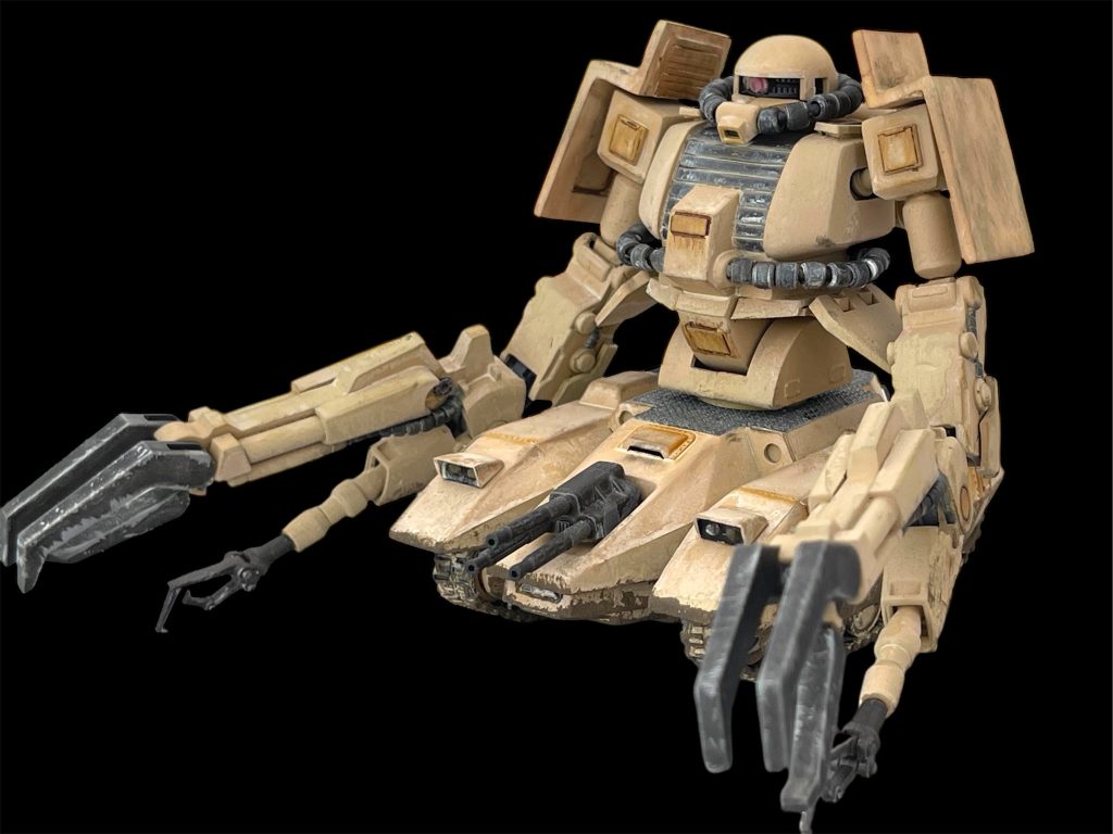 腕をもっとゴツくしたいと思い試行錯誤した結果、バイアランカスタムの腕が良さそうだと気付き、バイアランカスタム2号機の余剰パーツの腕部とオリジンザクの膝関節をミキシングしました。