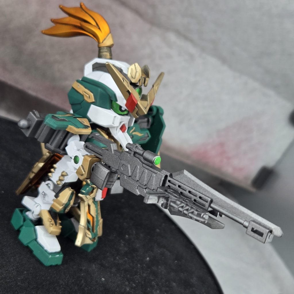 両手に銃とライフル持った状態