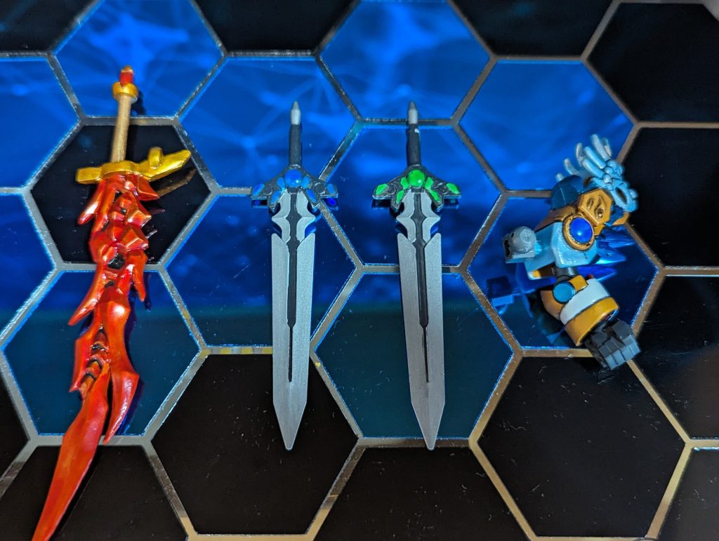 剣と肩当の装飾にはグリーンアイズとブルーアイズを使用(商品名)本来はプラモの目に使う改造部品をちまちま貼り付けました。(サイズ極小)汗