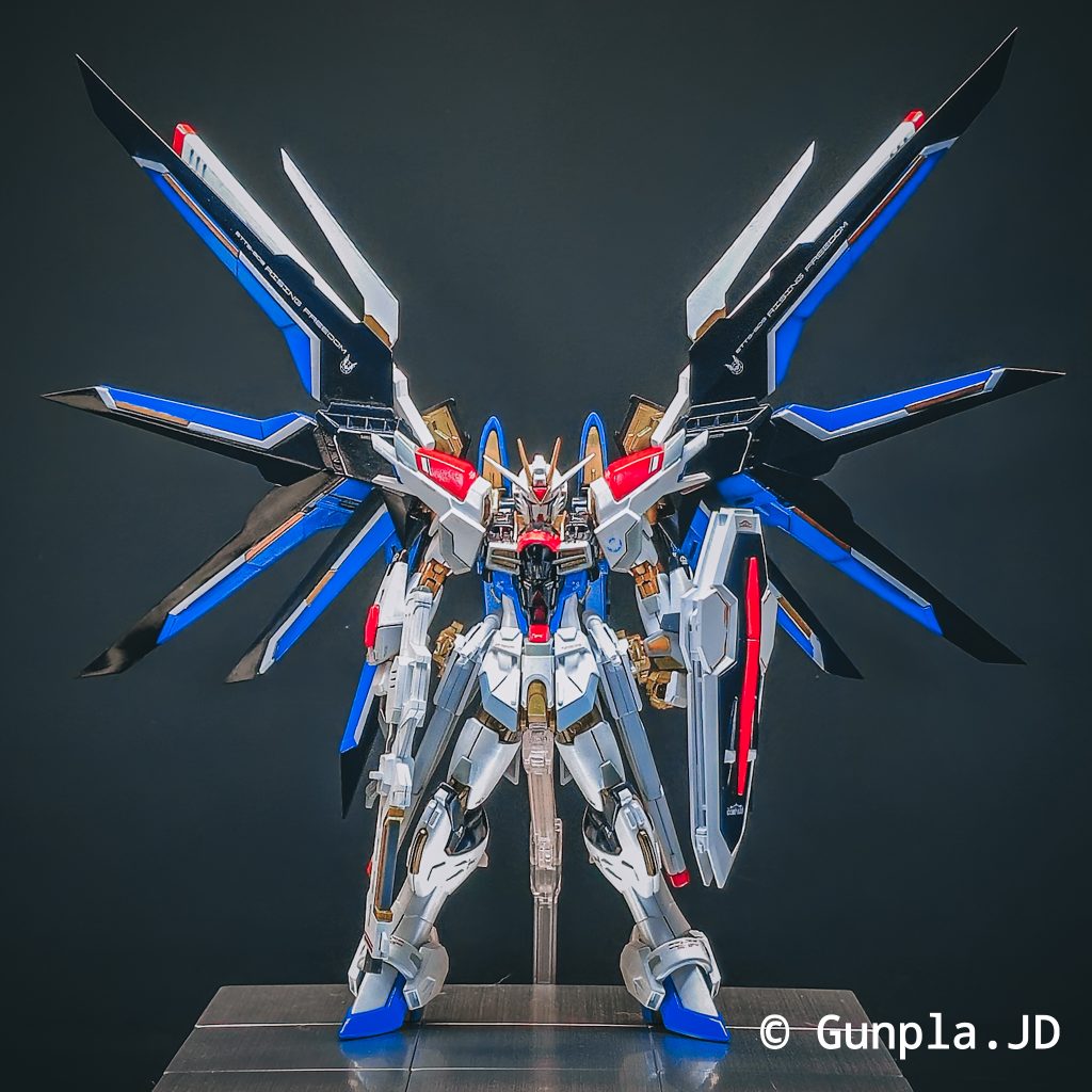 Base Kit : 1/144 RISING FREEDOM. Customs : Extended Arms, Abdomen, Wings.New scribed lines. Added pla plate for details. Painted original Freedom color scheme