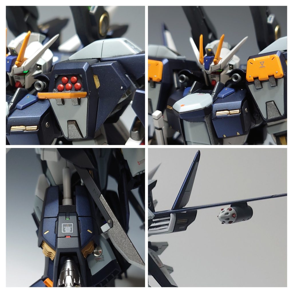 【その他武装】【220mm径5連装ミサイルポッド】　[設定]　両肩部装甲に内蔵されているミサイル。【105mm単装砲】 [設定]　レールガンと並行するように肩部にマウントされる単装砲。【ビームサーベル】 [設定]　両脚部に装備されている近接格闘戦用のビーム兵器。【無誘導ロケット弾ポッド】 [設定]　両翼に装備されているロケット弾射出ポッド。