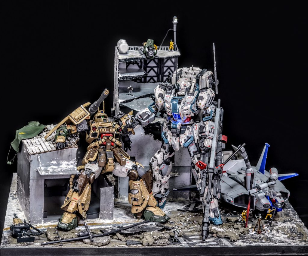 ジオン残党軍と連邦軍との間で起きた市街戦と兵士達のドラマをジオラマで表現しました360°どこから見ても新しい発見がある、見応えあるジオラマを目指しました