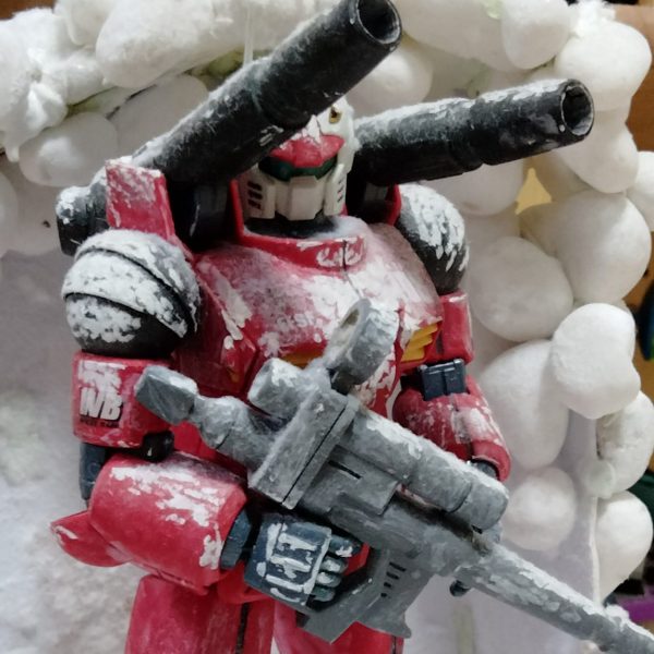 白銀に佇む紅の砲撃手