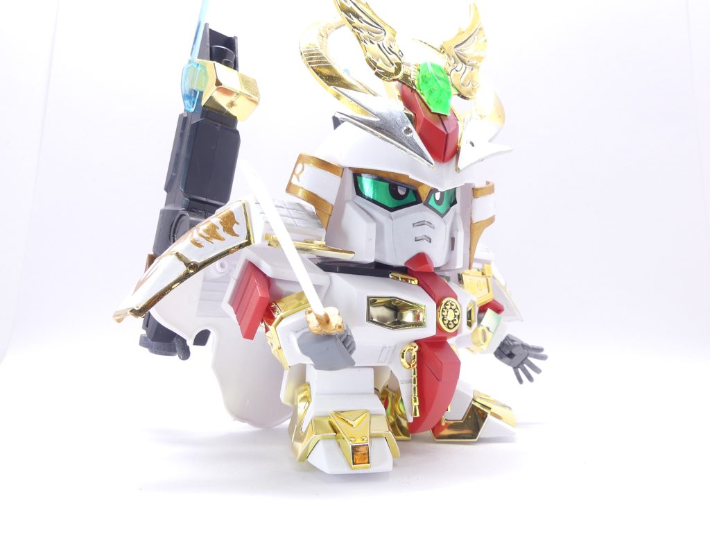 演者・シャクジイ・カイン：シャクジイ・ゲンゾウの息子。幼い頃からゲンゾウに「エバーランド」での冒険の話を聞かされ、それに憧れていたこともあってガンプラ、特にＳＤ関係に精通。高い工作技術を持ち、父の大将軍に若干の改造を加えることにも成功している。なお、「100倍」など明確に「強い」ものに興奮し狂喜乱舞する傾向。「100倍だぞ、100倍！！」※エバーランドではＧＰの都合で威力100倍にはなりませんそれ故、能力の倍加を喧伝しがちなガンドランダー、特に「ガンドラＩＩＩ」あたりに惹かれる。余談だが、シャクティ・カリンとは特に関係はない。見て下さい！※以下、豪華大将軍の説明書から引用※日輪剣：ふりかざすだけでパワーが大気を伝わり衝撃を与えるという名刀。兜の銀部分は金メッキを落として。