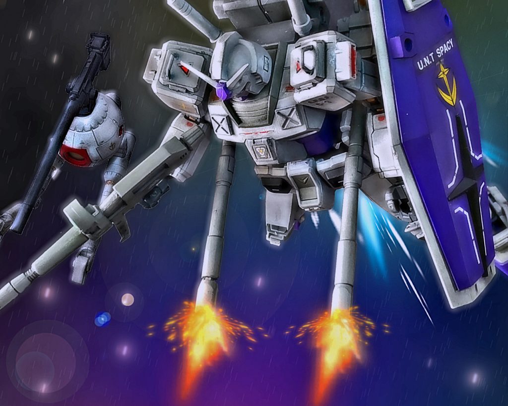 「…なんて奴だ…、あの機動兵器はっ…!?」チェスターは見たことのない高出力メガ粒子砲に驚きを隠せなかった。それでも我に返り、展開していた180㎜キャノンで狙いを定める。ロングレンジ対応の重火器だが、敵の新型機動兵器の速さを前に中々ロックオンができない。「くそっ、…いけよっ!!」それでも敵機を艦隊に接近させないよう牽制すべく発砲した。MSより大きいモビルアーマーだが、この機動力は想像を遥かに超えていた。チェスターは第2、第3射と連続で撃つが、忽ちレンジが縮まり2発目の時には既にロングからミドルの射程まで詰められていた。このままでは180㎜キャノンでは対応しきれないと判断すると今度はビームライフルに切り替える。その間にも敵機は接近し、その巨体が分かり始める。「大きい…、モビルスーツじゃない!?」チェスターからはまるで一つ目の大きい顔のモンスターが襲いかかるように見え一瞬怯んだ。