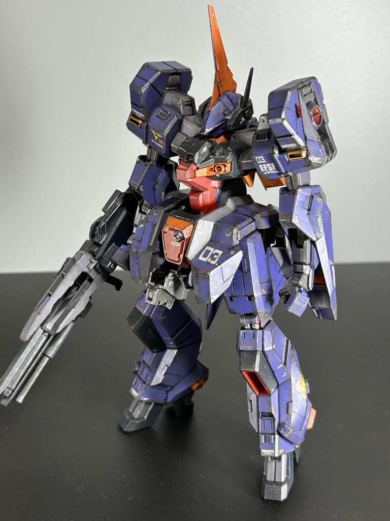 グリプス戦役に辛くも勝利したティターンズが簡易量産機と位置づけていたバーザムを主力量産機として改修した設定です