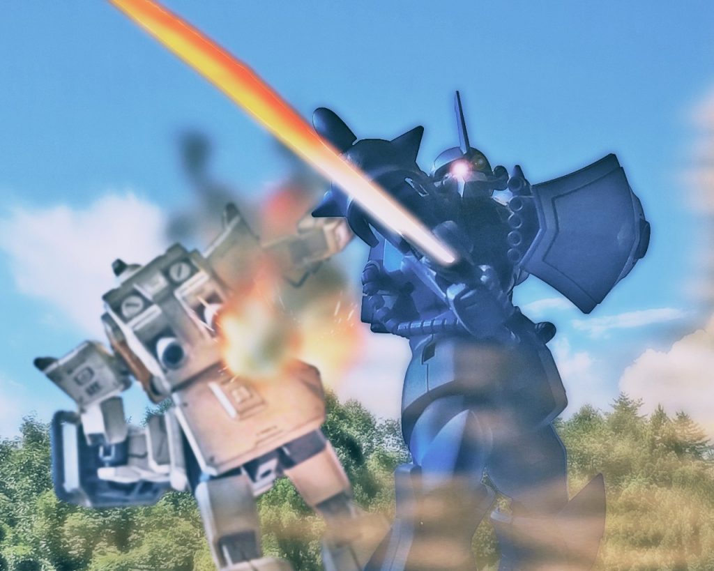 「全機怯むなっ、怯えたやつから死ぬぞっ!!グフは前にっ!!一気に行くっ!!」ビリーは全員に通達すると既に1機の連邦軍MSを撃破していた。脇腹をやられた陸戦型ジムはぐらつくと膝から崩れ落ち小さな爆発を繰り返し黒い煙を上げる。「まだ基地から増援は出てこないようだな」ビリーは指揮官ながら隊の士気高揚の為に先陣を切り、グフを走らせる。陸戦近接格闘に特化したグフはザクより機動力に勝り強襲作戦には向いている。だが対MS装備が多い点から大型施設の破壊等には火力不足は否めない。よって拠点制圧作戦では僚機に高火力装備のMSや戦車、爆撃機との連携が必要不可欠である。今回はドダイの先制爆撃からグフが突破口を作りバズーカ装備のザクが敵重要施設を破壊する算段だ。