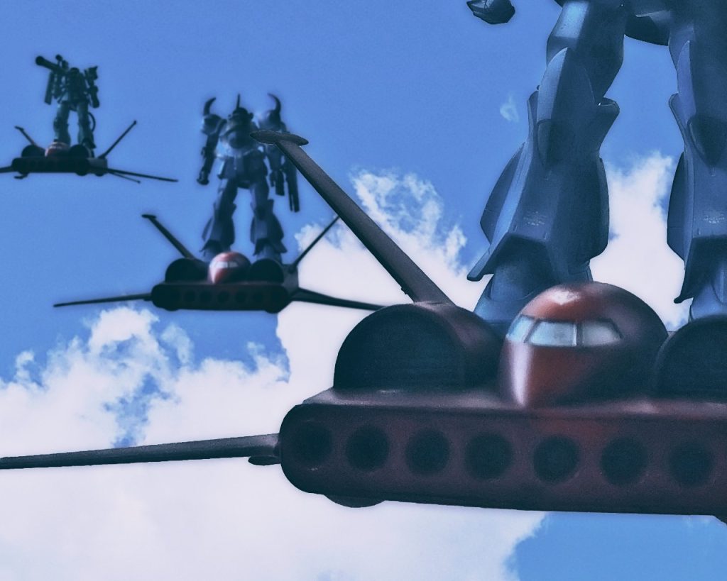 「ストーク、フルードシックスコンプ。ミサイル発射用意」全てのドダイが定位置に着くと、攻撃目標にミサイルの照準を合わせる。望遠カメラとレーザー測量器で主に基地の滑走路や司令部施設と思われる建物に狙いを定める。「ストークリーダー、ウィンド。ミサイル1から8番全て発射!全機攻撃開始!!」ドダイ全機は号令により、腹に抱えたミサイルを全て発射すると無数に伸びる白煙が空を駆け抜ける。「……では次は我々の番だ」ビリーはこれを合図に命令をだす。「リンドヴルム隊全機降下!!敵基地へ攻撃を仕掛ける!!」