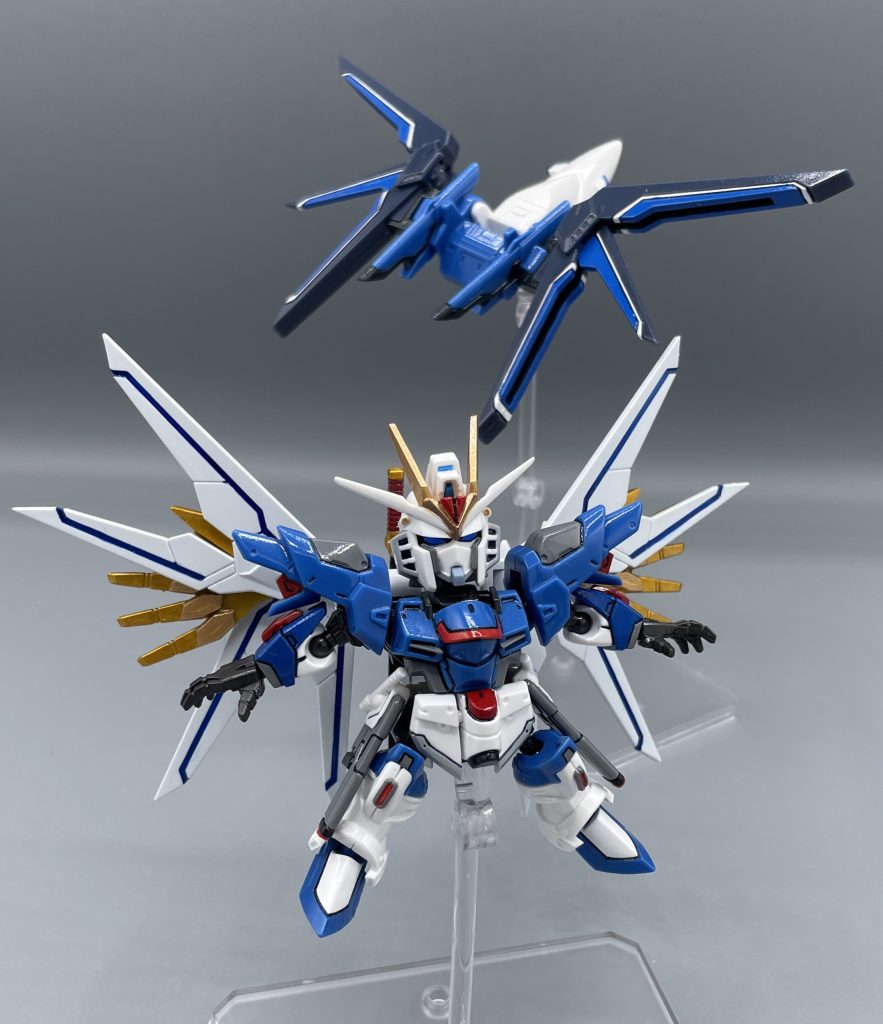 エンゲージ!!ディスラプター!!  「ファウンデーション事変」の後も、C.O.M.P.A.S.の主力MSとなったのはライジングフリーダムであり、プラウドディフェンダーとのオートマティック・ドッキング制御や、ディスラプター使用の為の頭部ユニットの改修が施された。 なお、ライジングフリーダムのVPS装甲との同調に伴い、プラウドディフェンダーの翼の色がピンクから鮮やかなブルーへと変化することとなった。