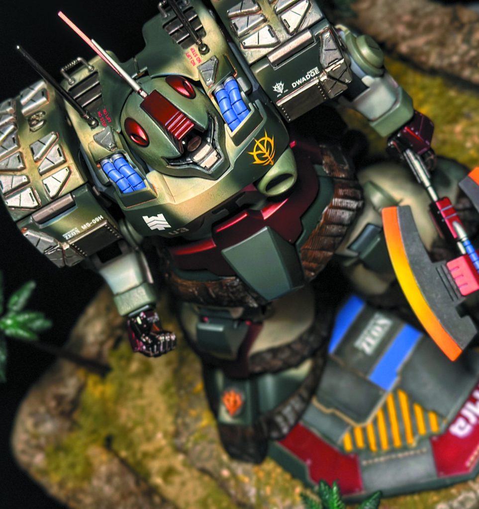 I used MS Builders parts to add scale armor, fin funnels, and embossed Zeon insignia.