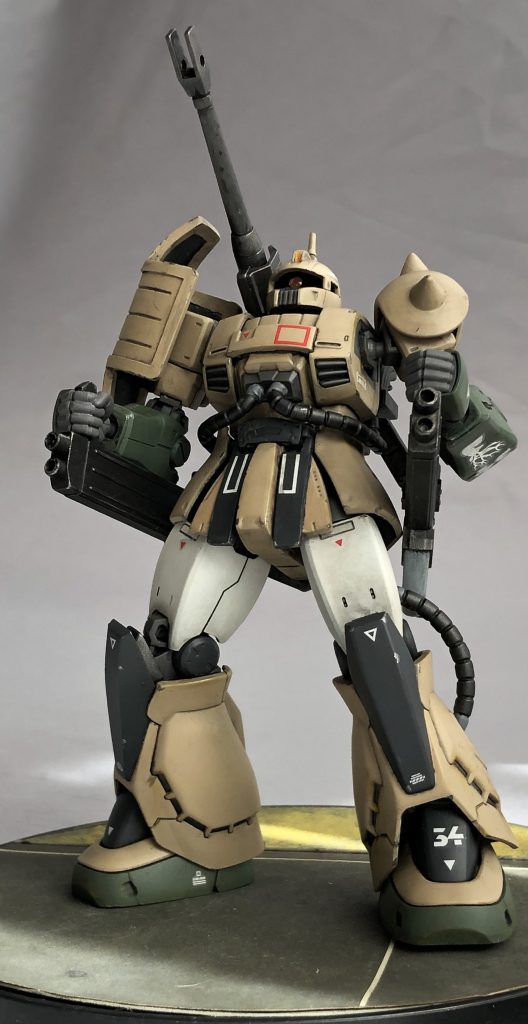 ボックスアート再現ショット(旧キット1/144編)。ザクキャノンと言えばこのポーズが印象的です。上空にフライマンタが幻視出来ます。