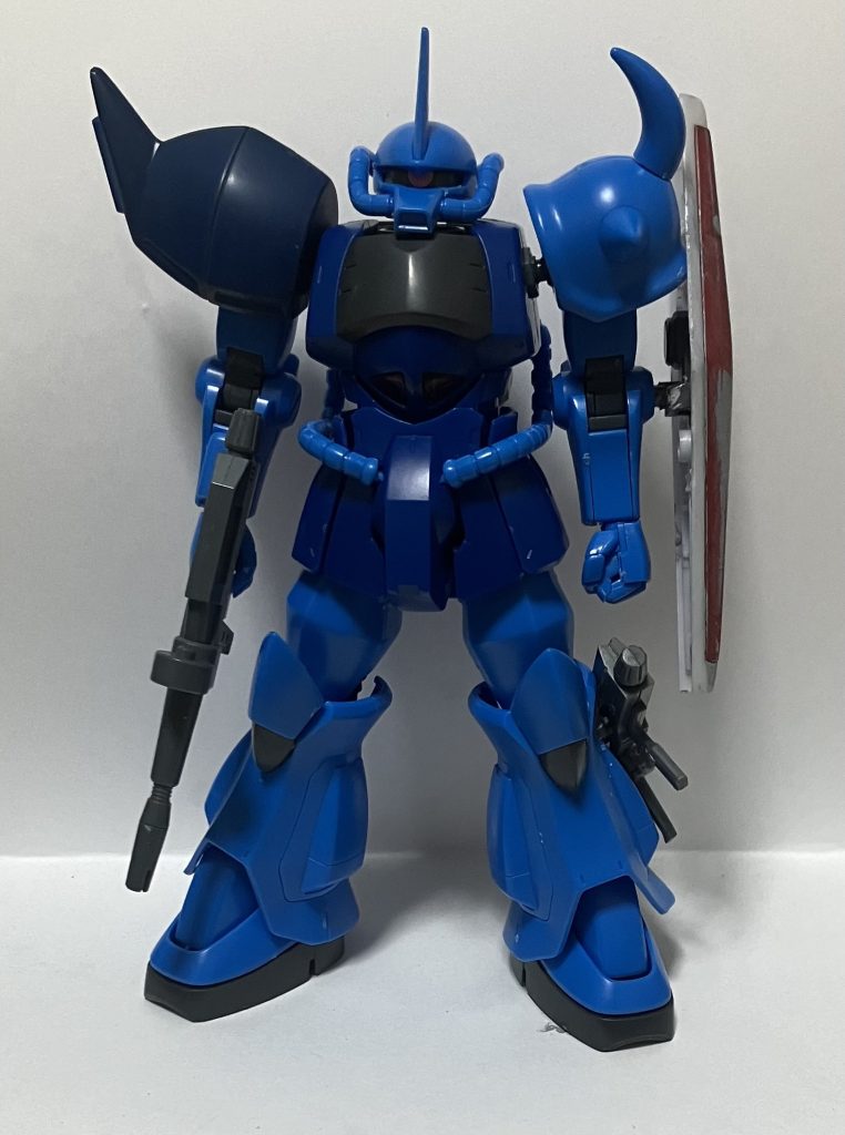 設定はAEに吸収されたジオニック社が余ったグフやザク、ゲルググのパーツを使い作った残党狩り用の急造機