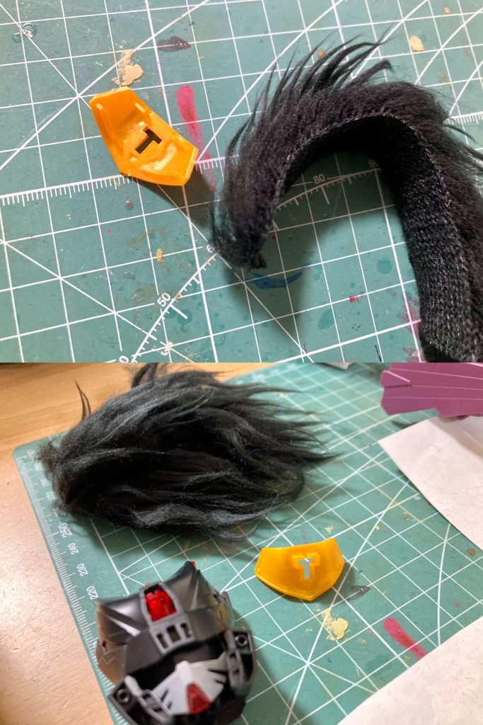 額の金色の前立はSD戦国伝 武神降臨編「織田信長頑駄無」のパーツを整形して接続し、天衝脇立は前頭部に接続ジョイントを増設の上でSDW三国創傑伝「孫堅ガンダムアストレイ」の剣をそのまま利用しました。こちらは本来の天衝脇立に近しくスクラッチで形状再現する事も考えましたが、左右対称で仕上げるのに少し手間と時間が掛かる事、また乱髪の方が割と再現度高い感じになったのでツノの方は多少ケレン味というか、SDWヒーローズっぽい派手さ・アレンジが効いてても面白いかなと考え、色々パーツを探してるうちに孫堅の剣に辿り着きました。