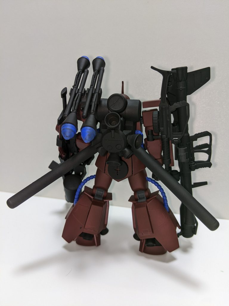 本機の作成背景として、武装を使い捨てながら敵基地へ突撃するケンプファーから着想を得ており、両腕部に搭載された武装はすべてパージが安易な手持ち武器や外付け武器が採用されている。