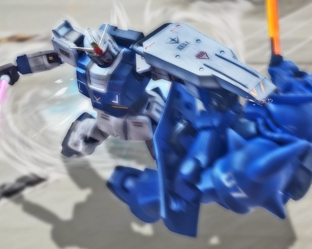 「女だと思って舐めるんじゃないよっ!!」ガンダムはスラスターでそのままグフに接近する。ビリーもフィンガーマシンガンで接近を許さないように応戦するが、ガンダムの機動力は想像以上であった。弾を掠めるように避けるとグフの至近距離に迫り、シールドの尖端を頭部メインカメラに突き刺す。「…コイツっ!!なんて向こう見ずなっ!?」ビリーはサーベルで斬りかかると思いきや逆の手で攻撃され反応しきれなかった。グフはメインカメラを潰され、後方へ大きく押し倒されると基地滑走路を削った。「…随分な戦い方だな」模擬戦でもしない近接格闘にルースも驚きを隠せなかった。「あんな無茶、俺でもしねぇぜ」「テストパイロットの動かし方じゃないな」「だからクリスにも言われるんだよ」「聞こえてるよっ!!アンタ達っ!!」ライラの怒声がフォルドとルースのコクピットに響く。