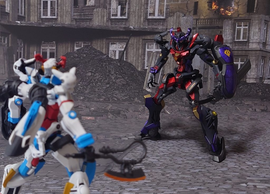 コロニー内での戦闘、スラム街が戦場になる。“あんた、この前の……!”