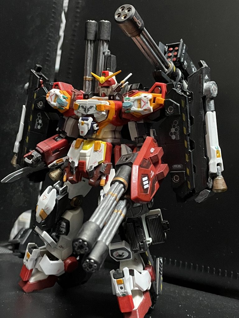 ウェポンユニット『ドゥルガー』装備両肩にはブースター付きの大型ミサイルユニット両足のミサイルコンテナにミサイルを追加アンクルガードに追加装甲かかと部分をキャタピラに変更し機動力向上リアスカートにもブースターを追加