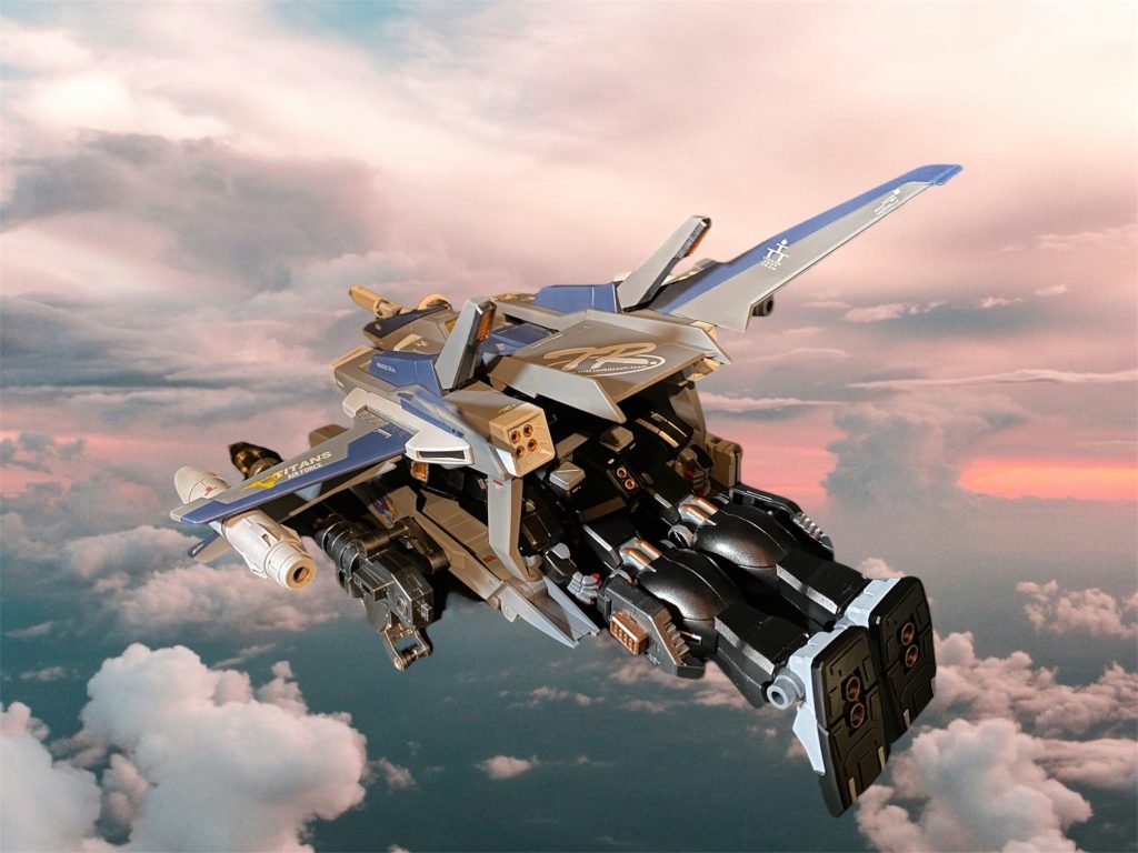 FF-X31  GオフェンサーはガンダムマークⅡ用に開発された無人支援戦闘機である。第二世代MSとして完成したガンダムマークⅡであったが、すでにアナハイム社内においても次世代機として可変MSの研究開発は進んでおり、旧式化してしまう非可変機を追加装備により可変機としてアップデートする事をコンセプトに設計された。元を辿ればその運用思想は一年戦争時にRX-78用に開発されたGファイターにまで遡ることになるが、複雑なコアブロックシステムを介した合体機構であったそれとは違い、本機はマークⅡのバックパックハードポイントに対応した接続方式がとられ、比較的簡易な合体・分離を可能とした。