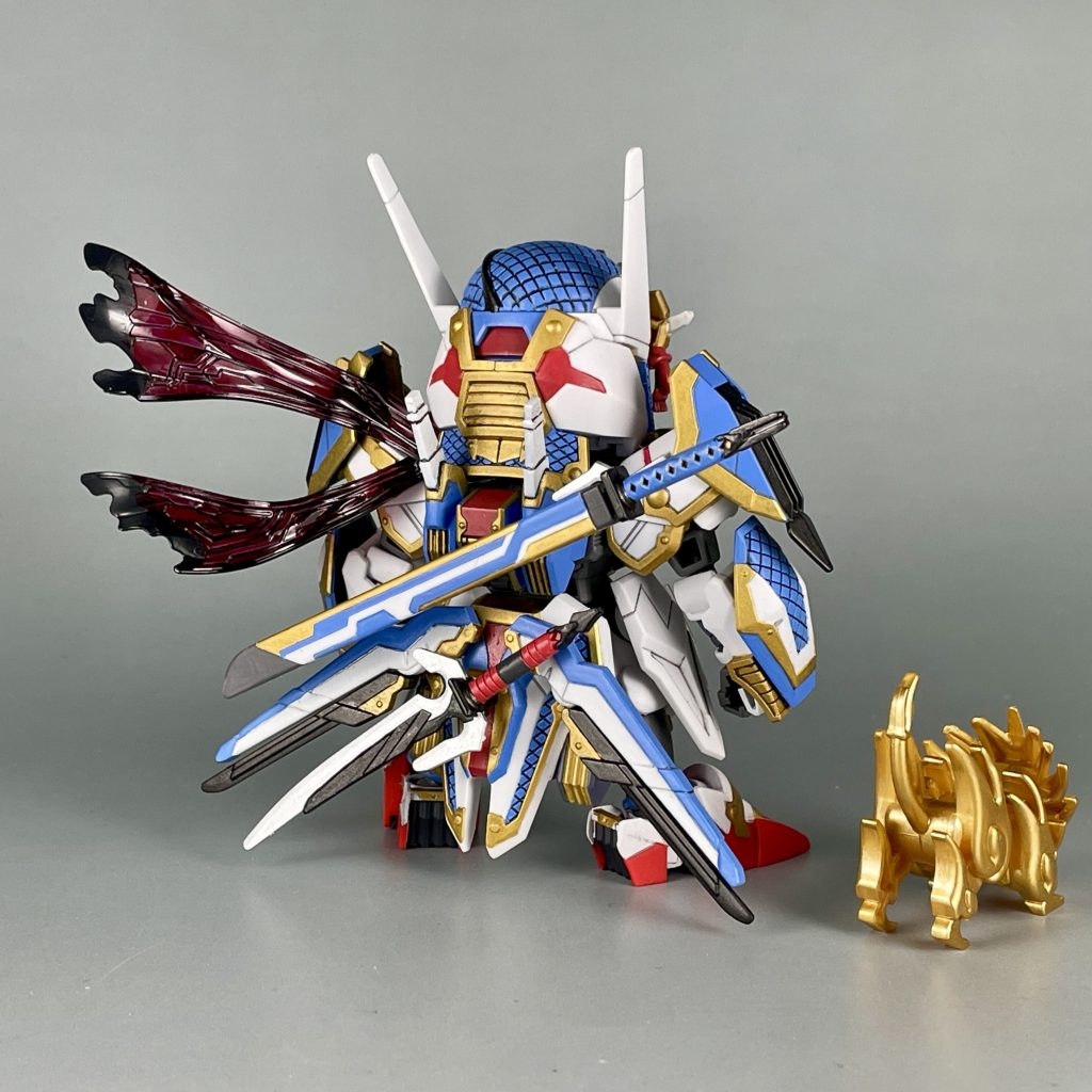 立ち姿。かつての隠密ガンダムをモチーフに見事に令和版に昇華させた感じですね。隠密なのにド派手なカラーと重装備なのはご愛敬。 【使用塗料】【本体】青部分:水性ホビーカラー ガンダムエアリアルブルー白部分:水性ホビーカラー ガンダムエアリアルホワイト赤部分:水性ホビーカラー ダリルバルデレッドダークグレー部分:水性ホビーカラー ガンダムファラクトグレー金部分:水性ホビーカラー スーパーファインゴールド黒部分:水性ホビーカラー 黒鉄色